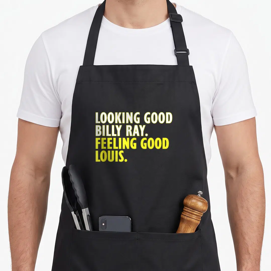 Ray billy apron - Yellow stacked text reading Looking Good Billy Ray Feeling Good Louis — shown on a black cotton canvas apron against a white background