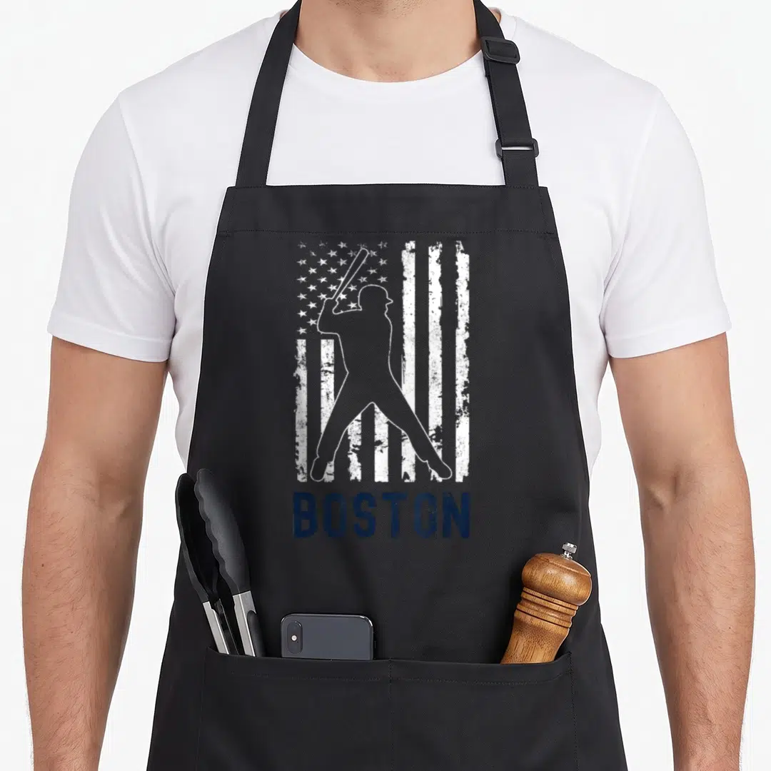 Boston american flag apron - White baseball batter silhouette over distressed flag with dark blue BOSTON text — shown on a black cotton canvas apron against a white background