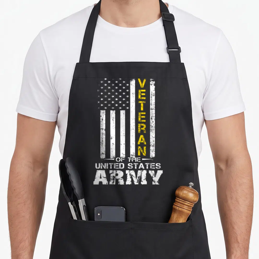 State us aprons - Distressed USA flag with vertical yellow VETERAN text and white stacked ARMY lettering — shown on a black cotton canvas apron against a white background