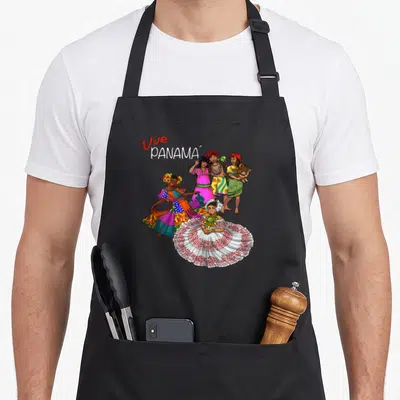 Panamanian heritage pride apron - Vive Panama text above four cartoon people in pink yellow blue and red traditional — shown on a black cotton canvas apron against a white background