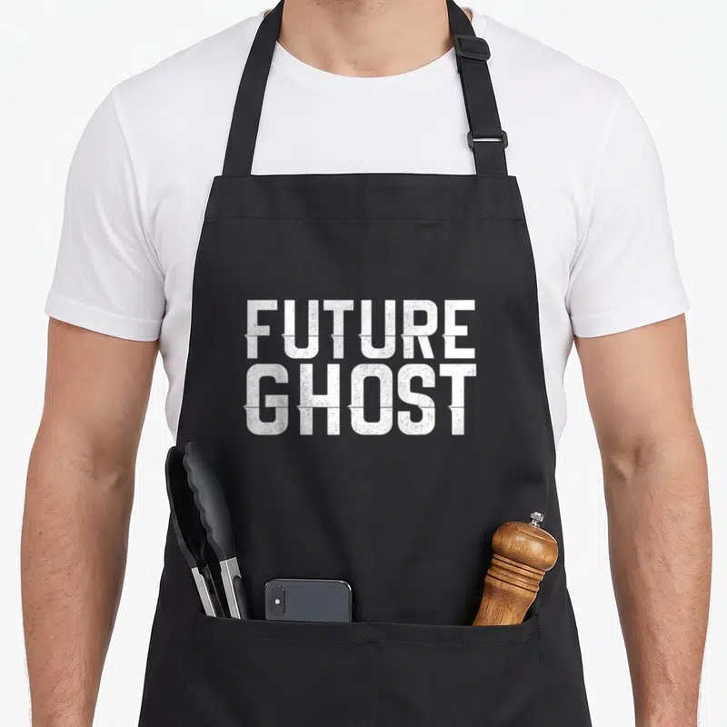 Future quick apron - Distressed white text reading FUTURE GHOST stacked in two lines — shown on a black cotton canvas apron against a white background