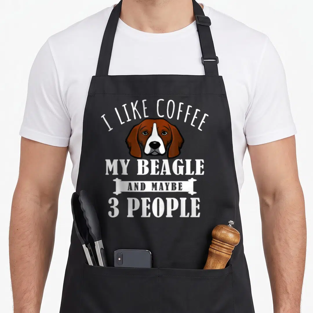 Coffee beagle dog apron - Cartoon beagle head with text I like coffee my beagle and maybe 3 people — shown on a black cotton canvas apron against a white background