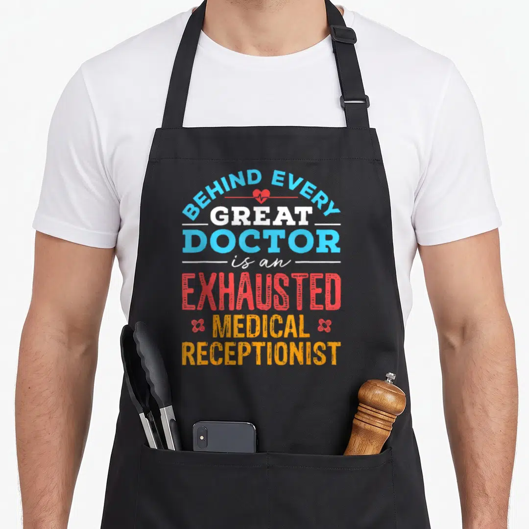 Medical office apron - Stacked text reading Behind Every Great Doctor Is An Exhausted Medical Receptionist in blue — shown on a black cotton canvas apron against a white background