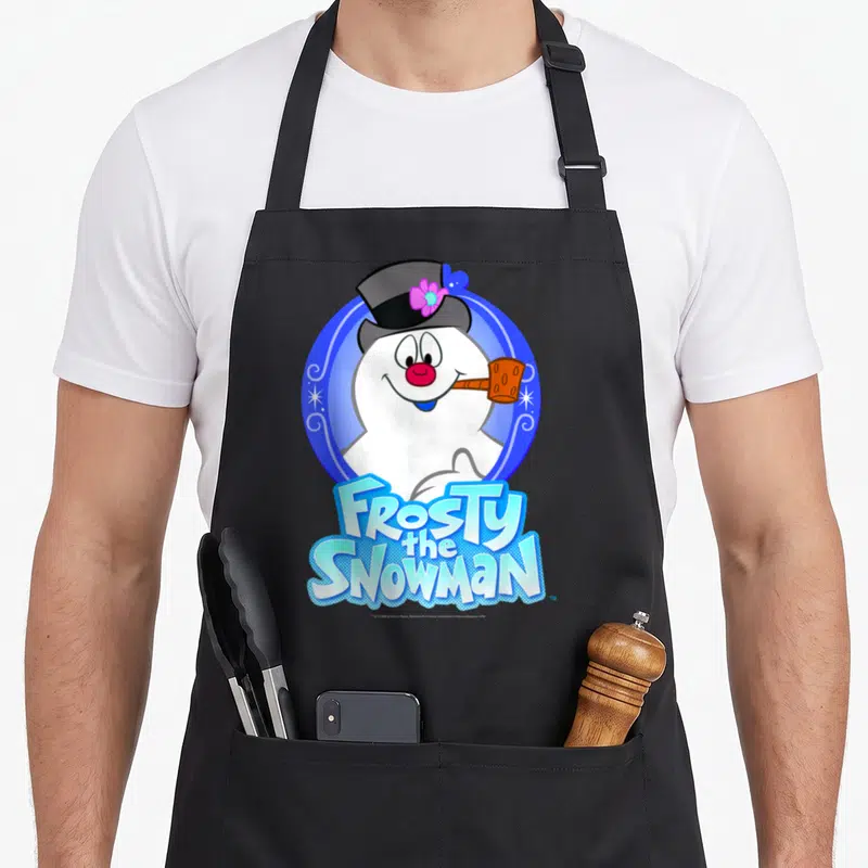 Frosty portrait snowman apron - Cartoon snowman in blue oval with stacked Frosty the Snowman text below — shown on a black cotton canvas apron against a white background