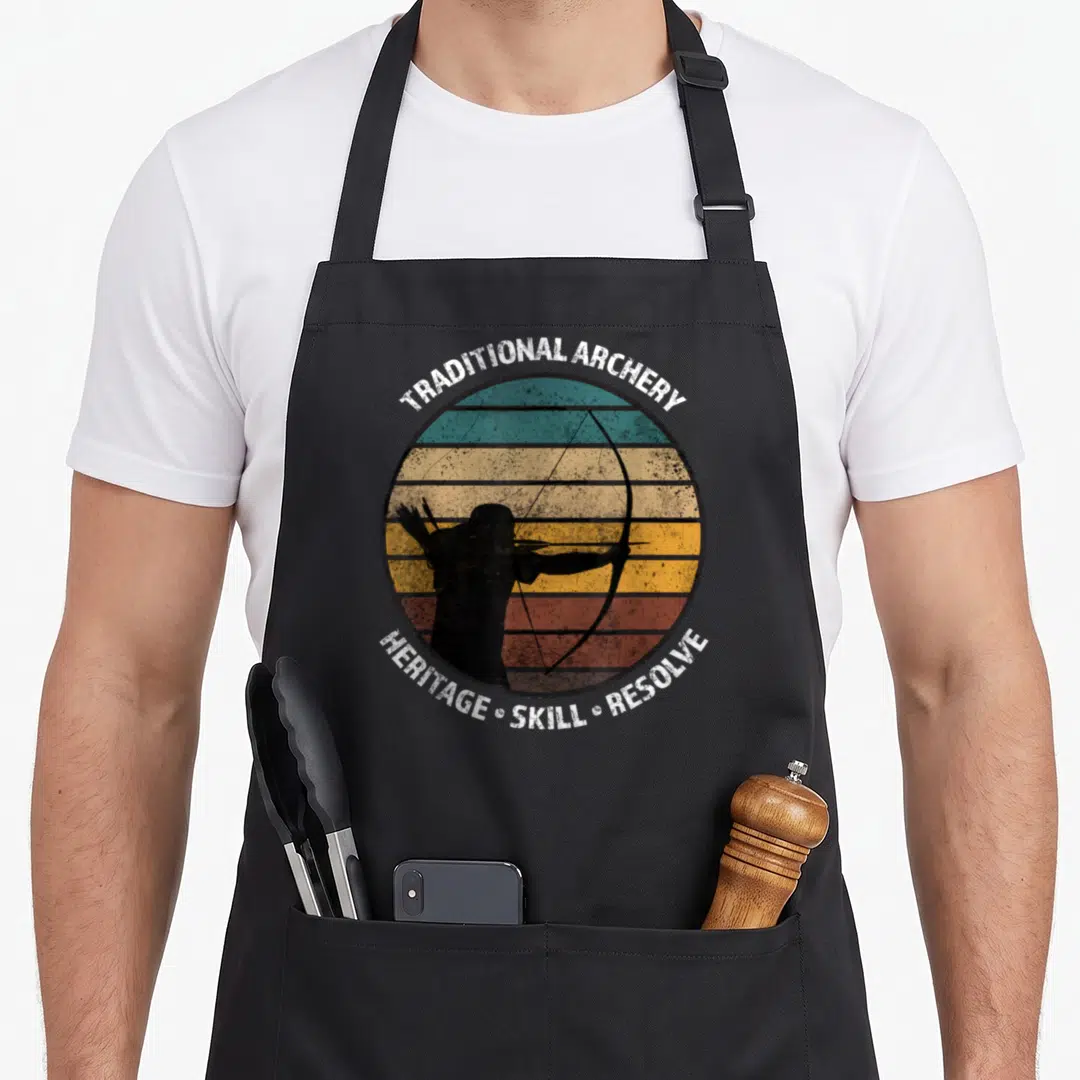 Archery traditional apron - Retro archer silhouette in circle with horizontal stripes and text TRADITIONAL ARCHERY — shown on a black cotton canvas apron against a white background
