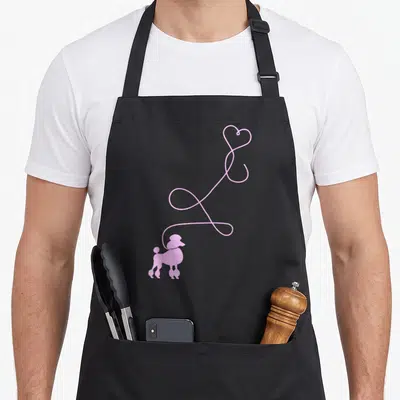 Sock dog apron - Pink poodle silhouette with swirling line forming a heart above — shown on a black cotton canvas apron against a white background