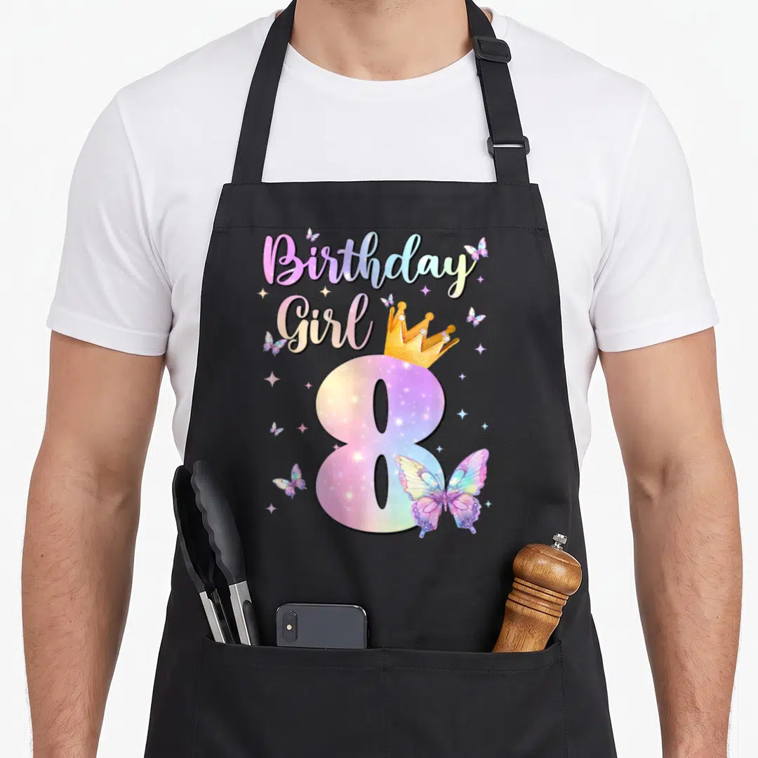 Bday butterfly aprons - Number 8 with gold crown, butterflies, and Birthday Girl text in pastel gradients — shown on a black cotton canvas apron against a white background