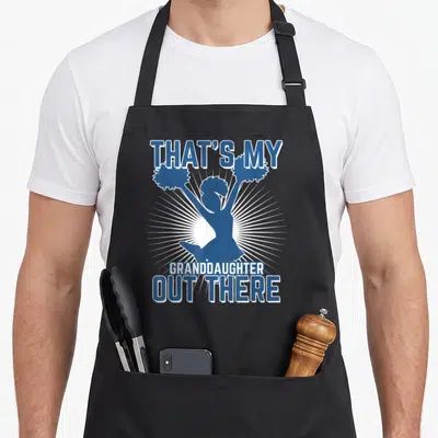 Cheer grandpa apron - Blue cheerleader silhouette with pom-poms and white sunburst rays surrounded by bold text — shown on a black cotton canvas apron against a white background
