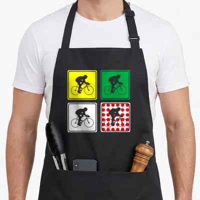 Racing road apron - Four square signs with grey cyclist silhouettes on yellow green white and red polka dot backgrounds — shown on a black cotton canvas apron against a white background