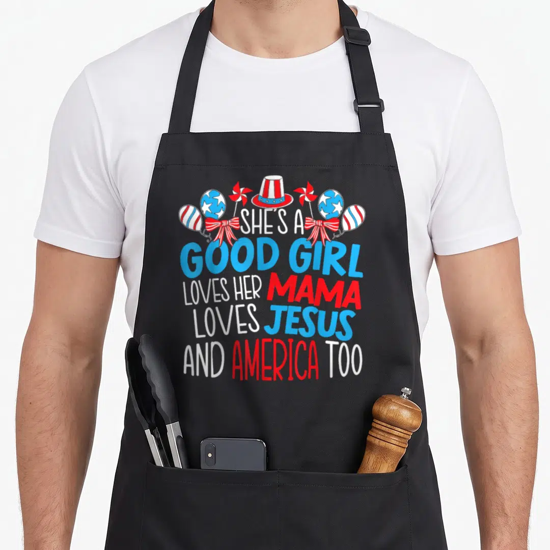 Patriotic 4th of july apron for men - She's a good girl loves her mama loves Jesus and America too text with patriotic — shown on a black cotton canvas apron against a white background