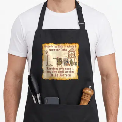 See medieval apron - Man pointing at barren field with sarcasm text in retro medieval art style — shown on a black cotton canvas apron against a white background