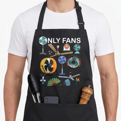 Ventilator f1 fan apron - Cartoon fans in white blue yellow green red with ONLY FANS text at top — shown on a black cotton canvas apron against a white background