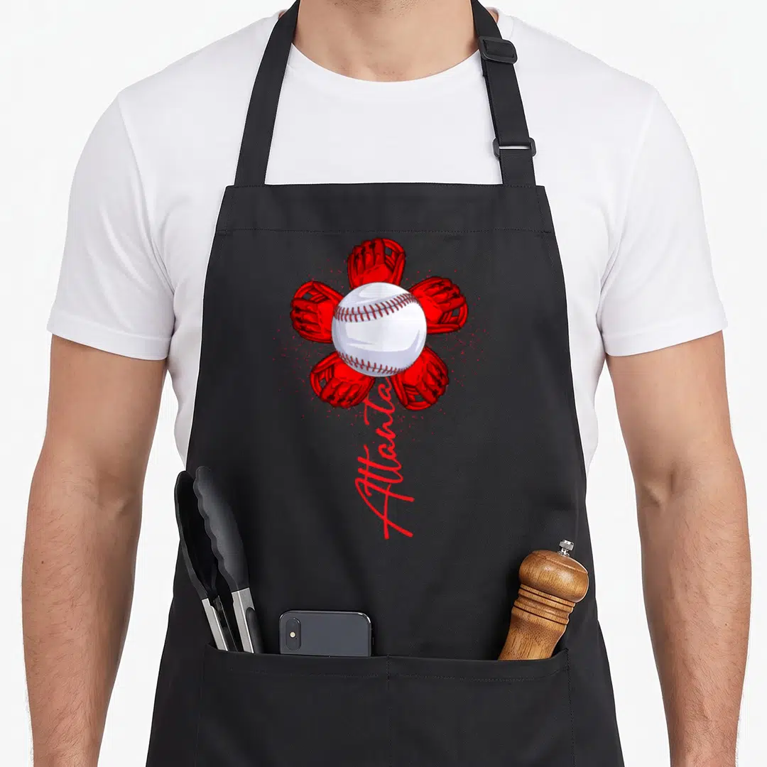 Flower baseball apron - White baseball surrounded by four red gloves in flower shape with vertical Atlanta script — shown on a black cotton canvas apron against a white background