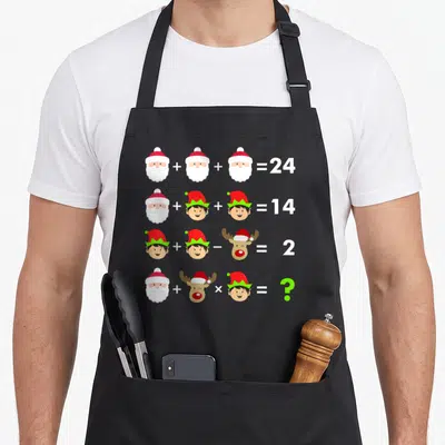 Teacher christmas apron - Four rows of math equations with Santa, elf, and reindeer heads ending in equals signs — shown on a black cotton canvas apron against a white background