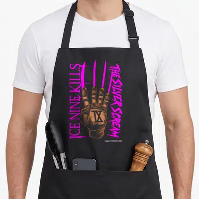 Nine halloween apron - Hand with three pink claws and roman numeral IX flanked by vertical pink text — shown on a black cotton canvas apron against a white background