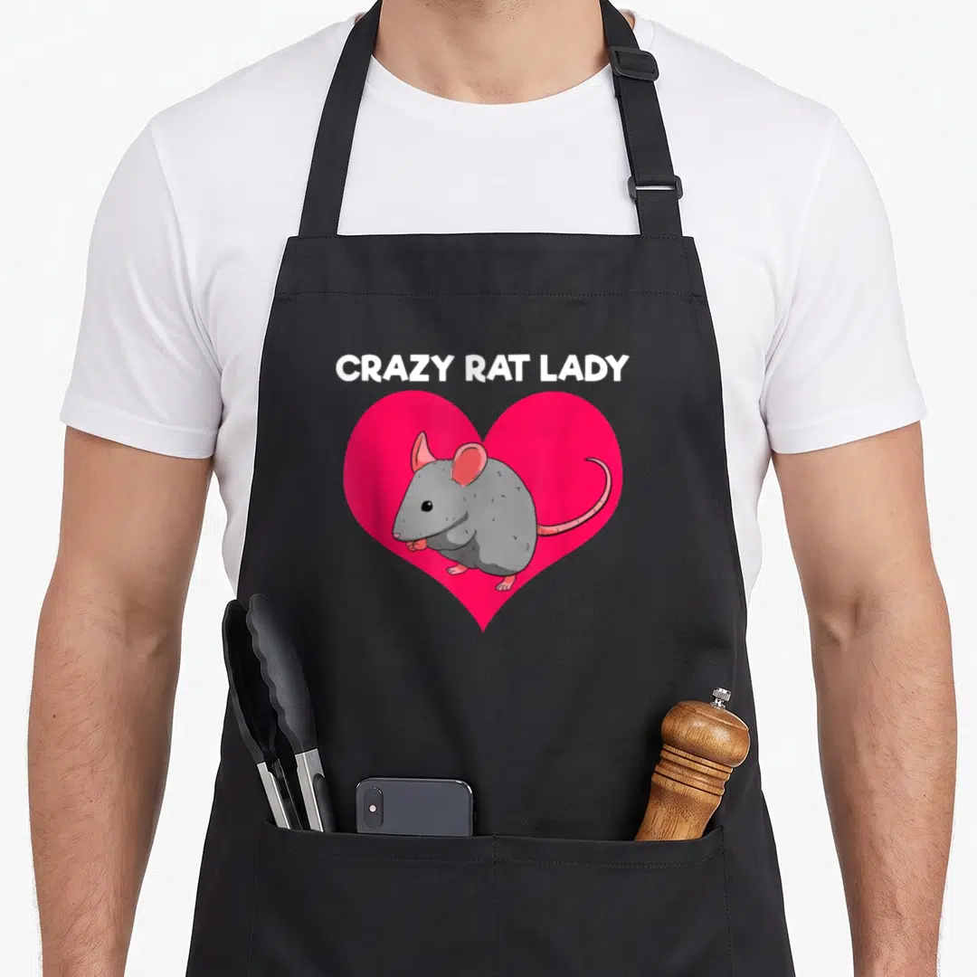 Rat rodent pet apron - CRAZY RAT LADY text above grey rat in pink heart — shown on a black cotton canvas apron against a white background