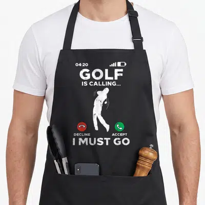 Calling golf apron - Distressed phone screen graphic with golfer silhouette and decline accept buttons — shown on a black cotton canvas apron against a white background