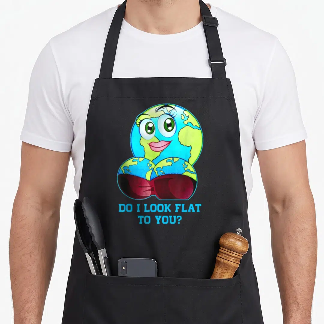 Flat mother's day aprons - Cartoon earth with female face, breasts, pink lips, and blue text DO I LOOK FLAT TO YOU — shown on a black cotton canvas apron against a white background