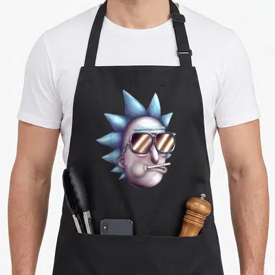 Reality alternative apron - Realistic head of man with blue spiky hair and gold aviator sunglasses — shown on a black cotton canvas apron against a white background