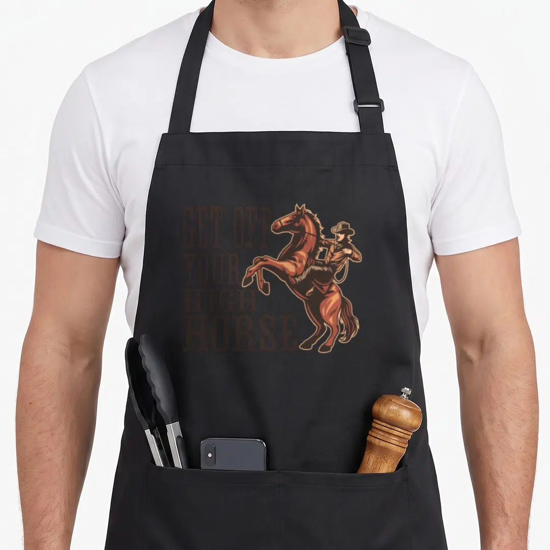 Horse country kitchen apron - Stacked GET OFF YOUR HIGH HORSE text next to a rearing brown horse with rider — shown on a black cotton canvas apron against a white background