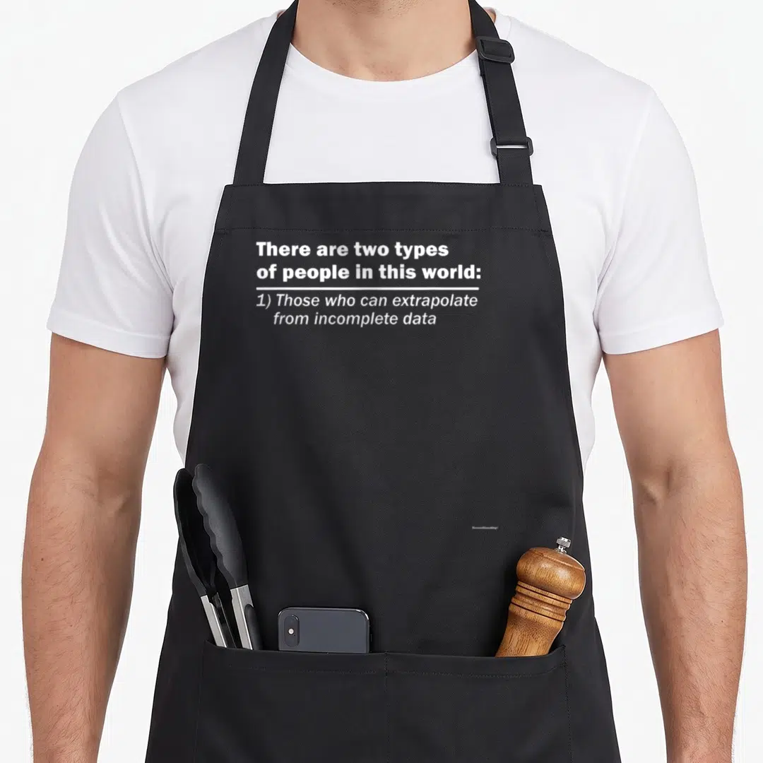 Intelligentshirt novelty apron - White text reading There are two types of people in this world separated — shown on a black cotton canvas apron against a white background