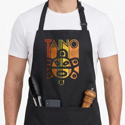 Taino albarino apron - Retro TAINO petroglyph with vertical red orange yellow grey stripes — shown on a black cotton canvas apron against a white background