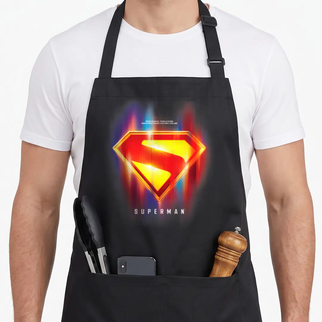 Glowing choice aprons - Glowing red yellow S-shield with white quote text and blurred colorful background — shown on a black cotton canvas apron against a white background