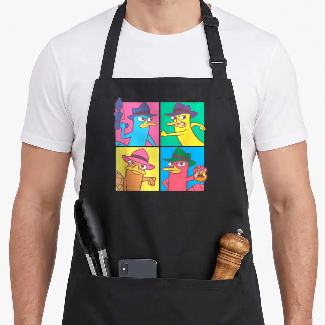 Phineas box apron - Four colored platypuses in fedoras arranged in a 2x2 cartoon grid — shown on a black cotton canvas apron against a white background