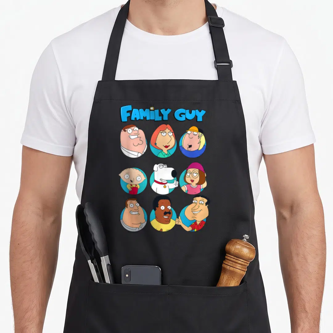 Quahog box apron - FAMILY GUY logo above nine character heads in colored circles — shown on a black cotton canvas apron against a white background