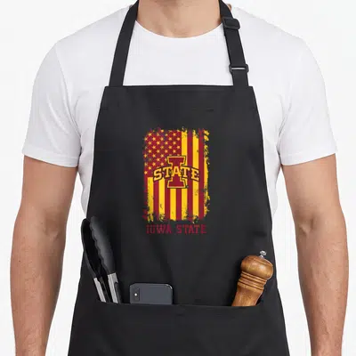 Iowa american flag apron - Distressed red and yellow flag with large I logo and STATE text below — shown on a black cotton canvas apron against a white background