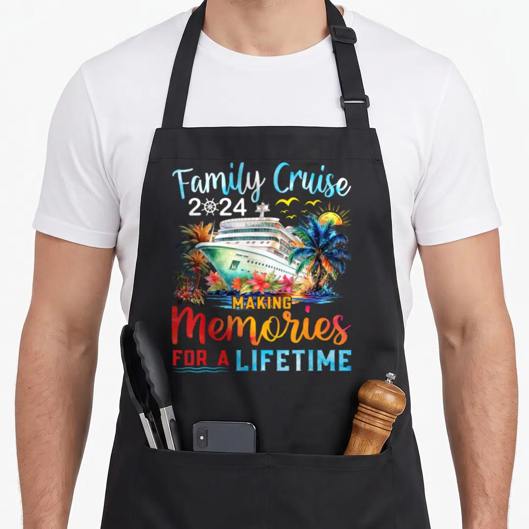 Cruise vacation family aprons - Watercolor cruise ship with palm trees and text Family Cruise 2024 MAKING Memories — shown on a black cotton canvas apron against a white background