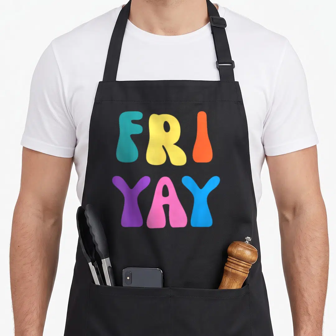 Yay friyay teacher apron - Stacked FRI YAY text in teal yellow orange purple pink and blue bubble letters — shown on a black cotton canvas apron against a white background