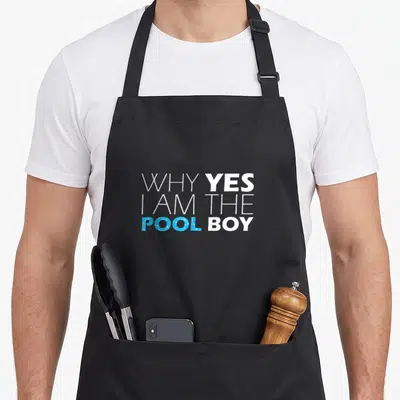 Pool puddle apron - White text WHY YES I AM THE POOL BOY with blue water pattern in POOL letters — shown on a black cotton canvas apron against a white background