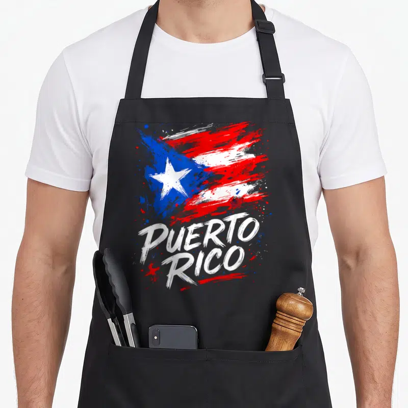 Boricua hispanic aprons - Distressed brush stroke Puerto Rican flag with white PUERTO RICO text below — shown on a black cotton canvas apron against a white background