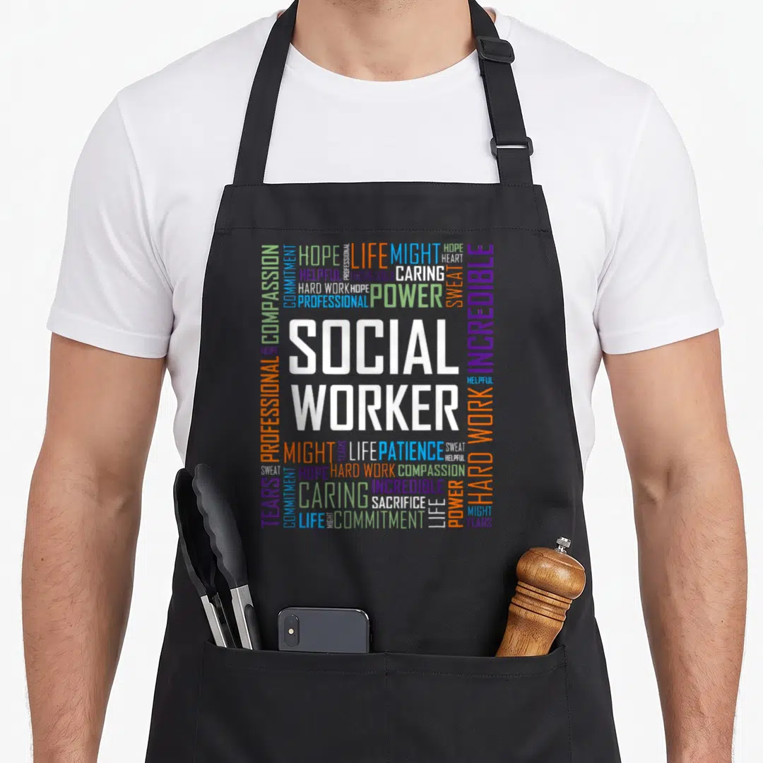 Funny social worker apron - Square word cloud with SOCIAL WORKER in white surrounded by HOPE TEARS CARING in blue green — shown on a black cotton canvas apron against a white background