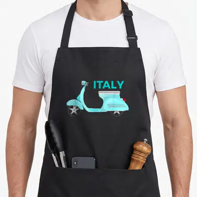 Scooter italian apron - Light blue scooter illustration with ITALY text in cartoon style — shown on a black cotton canvas apron against a white background