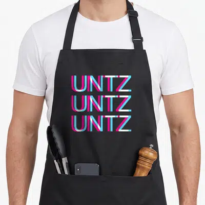 Untz edm apron - Stacked pink blue and white UNTZ glitch typography design — shown on a black cotton canvas apron against a white background