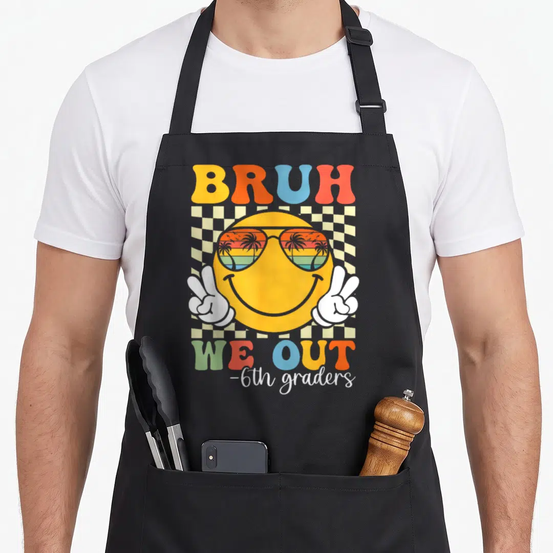 6th bruh grade apron - Retro smiley face sunglasses peace signs BRUH WE OUT 6th graders text checkered background — shown on a black cotton canvas apron against a white background