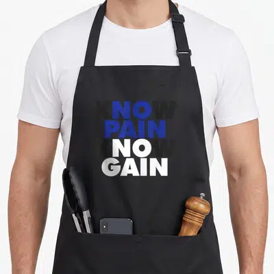 Pain gains apron - Stacked KNOW PAIN KNOW GAIN text in grey, blue, and white block letters — shown on a black cotton canvas apron against a white background