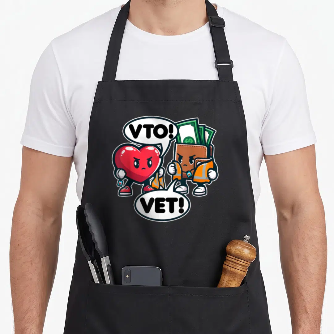 Swagazon vet apron - Red heart and brown wallet cartoon characters wearing safety vests with VTO and VET text bubbles — shown on a black cotton canvas apron against a white background