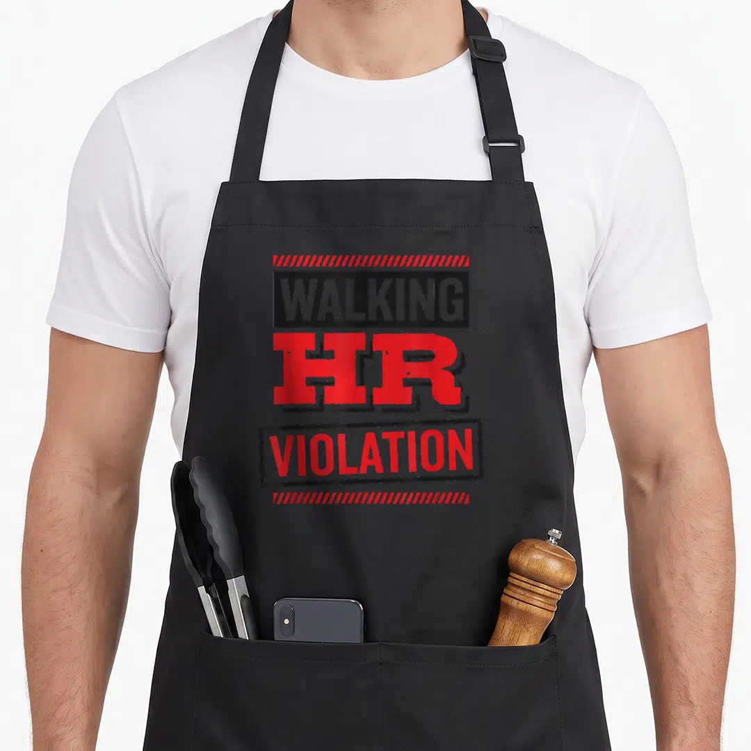 Resource walking apron - WALKING HR VIOLATION text in red grey black with diagonal striped bars and rectangular box — shown on a black cotton canvas apron against a white background
