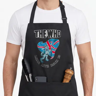 Funny live rock apron - Crowned lion holding flag with THE WHO and LONG LIVE ROCK 79 text in distressed blue red white — shown on a black cotton canvas apron against a white background