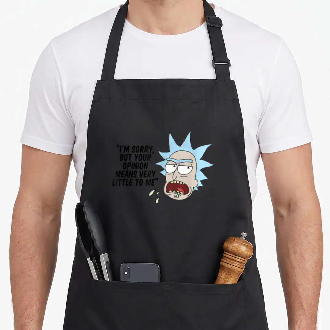 Opinion general apron - Rick Sanchez cartoon head with blue hair and drool beside stacked black text reading I'm sorry — shown on a black cotton canvas apron against a white background