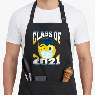 Class face apron - Yellow emoji wearing blue mask and cap with Class of 2021 text — shown on a black cotton canvas apron against a white background