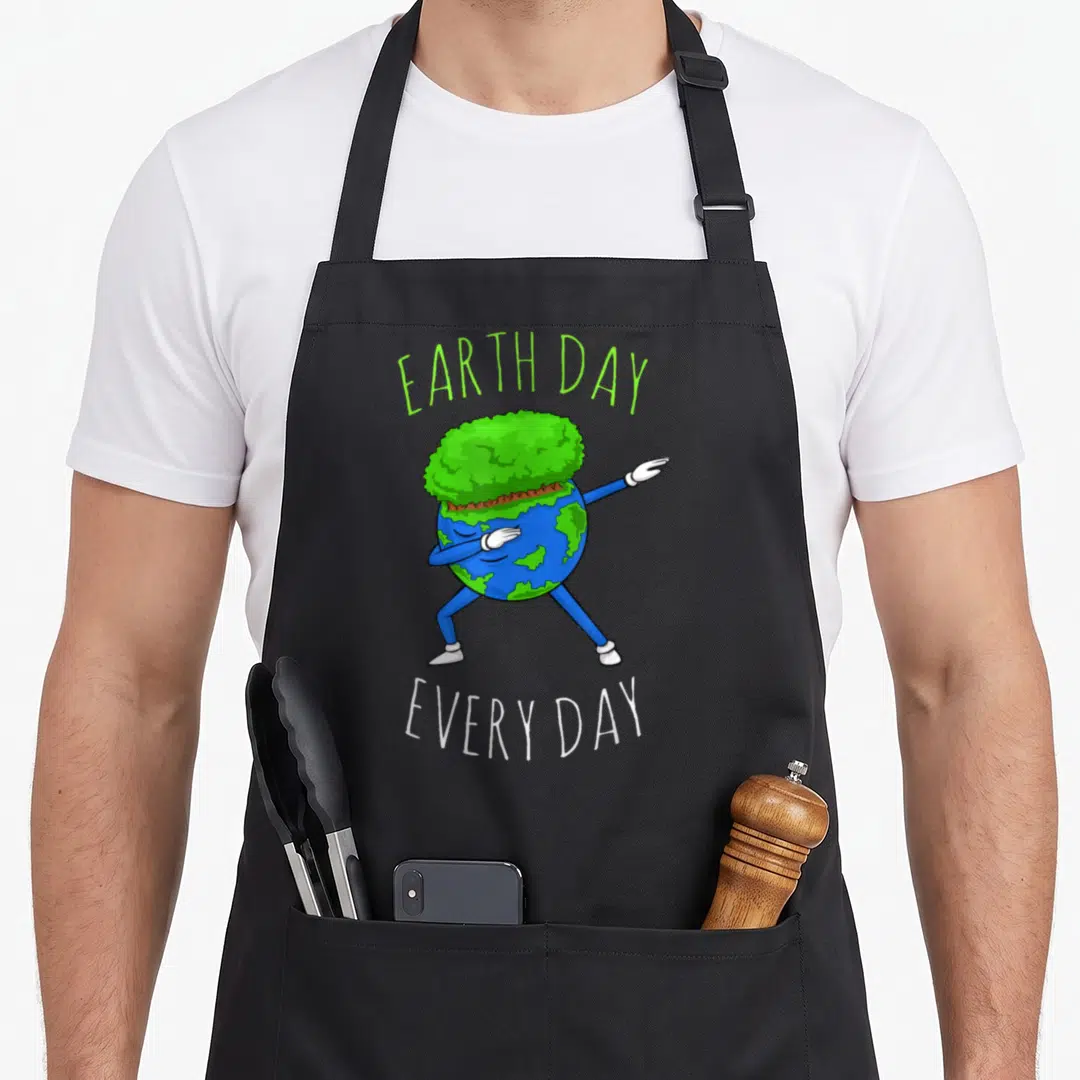 Recycle science apron - Dabbing cartoon Earth with EARTH DAY EVERY DAY text in blue and green — shown on a black cotton canvas apron against a white background