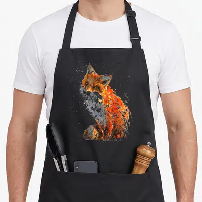 Fox hand painted apron - Watercolor fox in orange white and grey on black bib apron — shown on a black cotton canvas apron against a white background