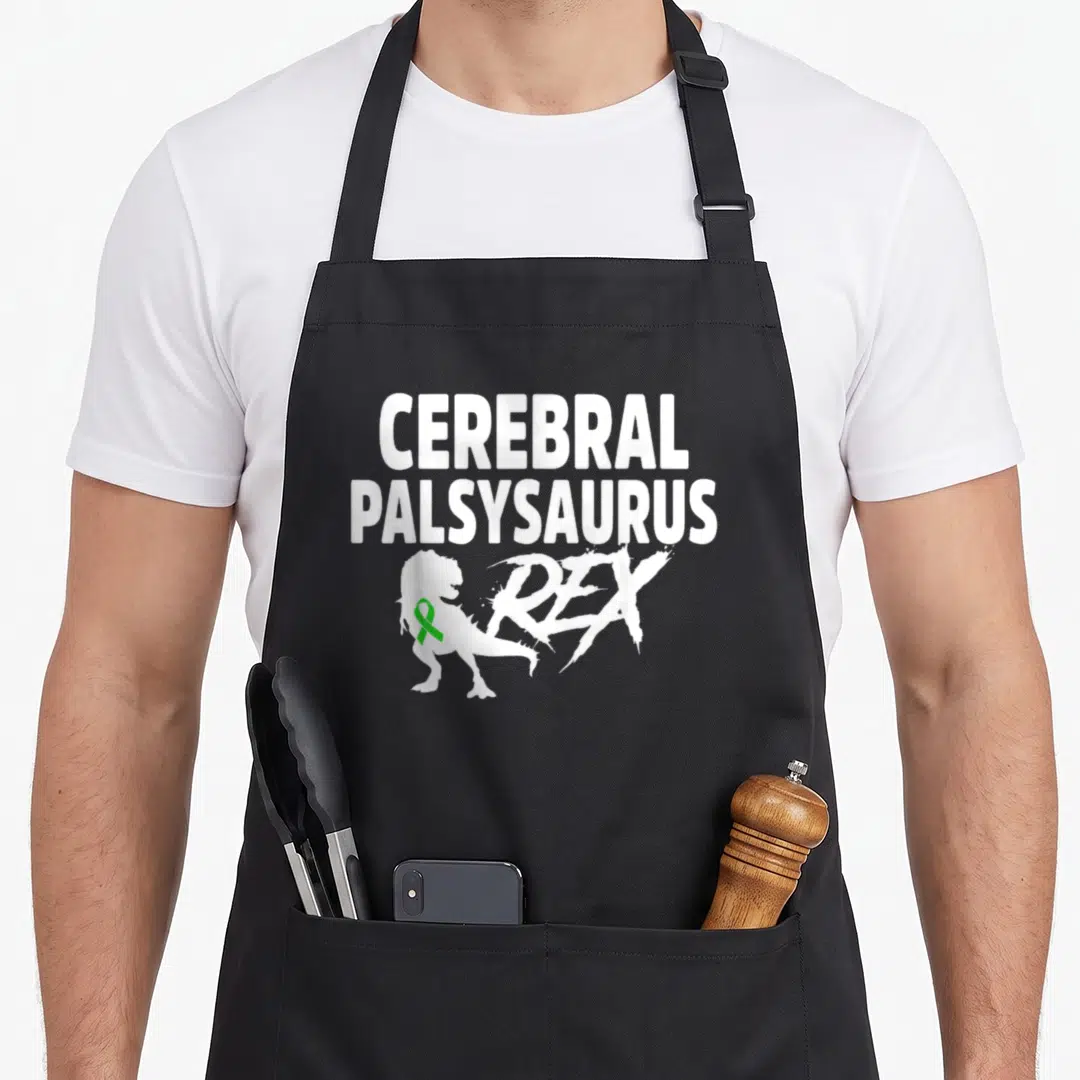 Saurusrex cerebral palsy awareness apron - White stacked text CEREBRAL PALSYSAURUS REX with dinosaur silhouette — shown on a black cotton canvas apron against a white background