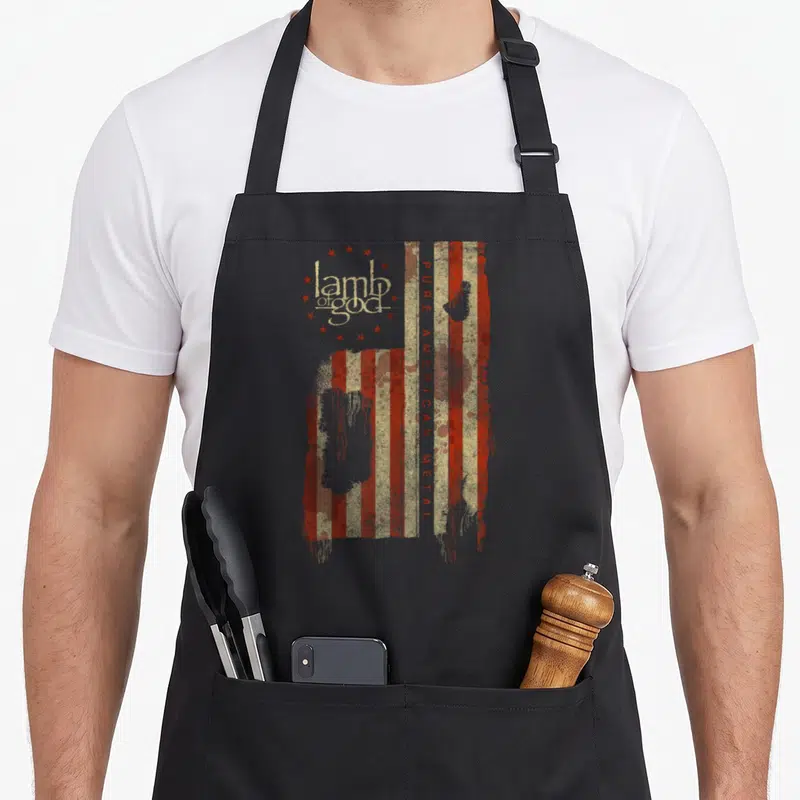 Lamb american flag apron - Distressed red beige vertical flag with lamb of god logo and pure american metal text — shown on a black cotton canvas apron against a white background