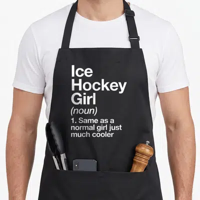 Ice sassy apron - White stacked text reading Ice Hockey Girl noun definition same as normal girl much cooler — shown on a black cotton canvas apron against a white background