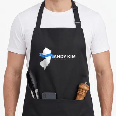 Andy midterms apron - White NJ map with blue ribbon reading Blue Wave 2018 Andy Kim New Jersey 3rd — shown on a black cotton canvas apron against a white background